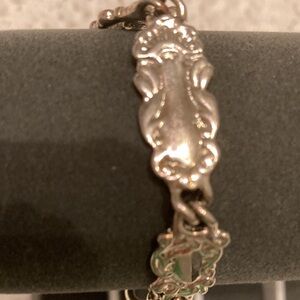 Silver tone bracelet.